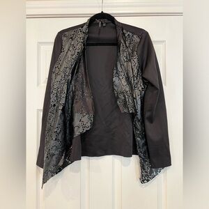 Black faux leather top w/cutouts by Kay Celine. Size large To be worn w/cami